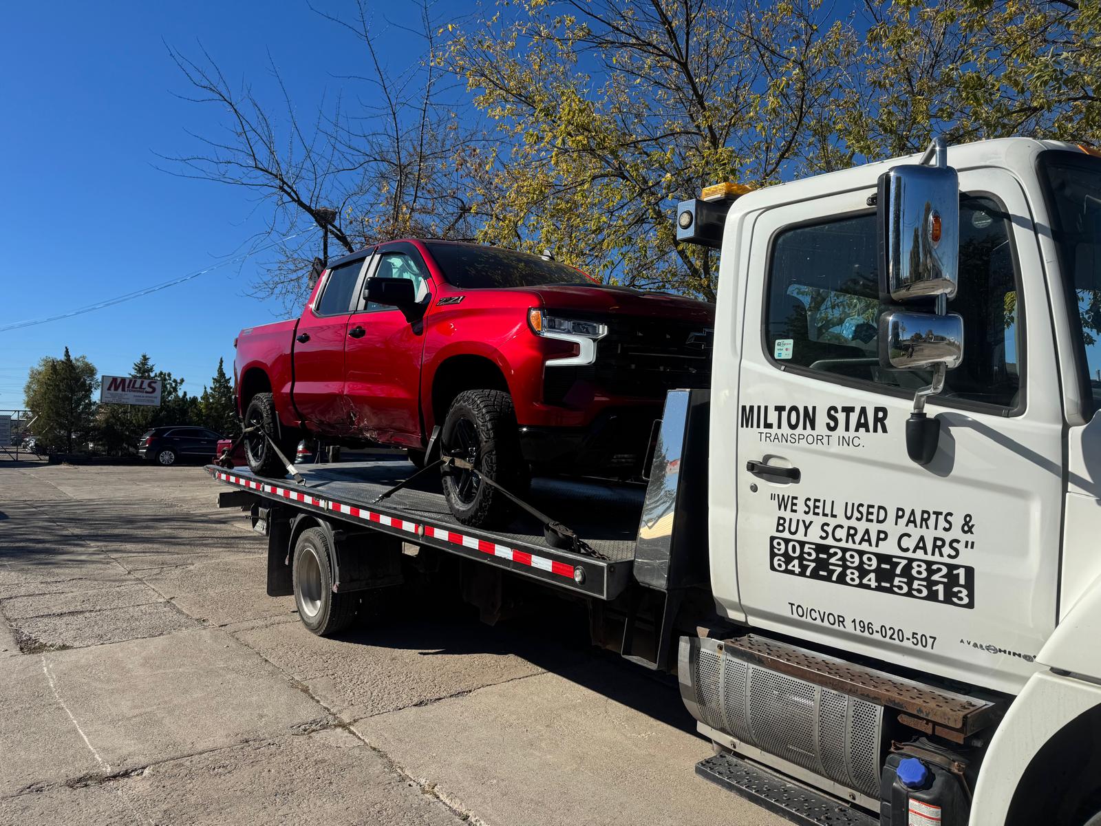 Milton Star Transport flatbed with red Chevrolet